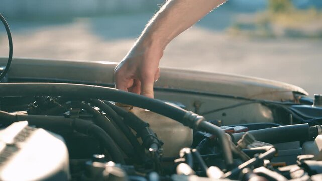 Man Hand Opening Car Windshield Washer Fluid Cap | Close Up Engine Bay Maintenance Under Hood | Slow Motion Auto Care