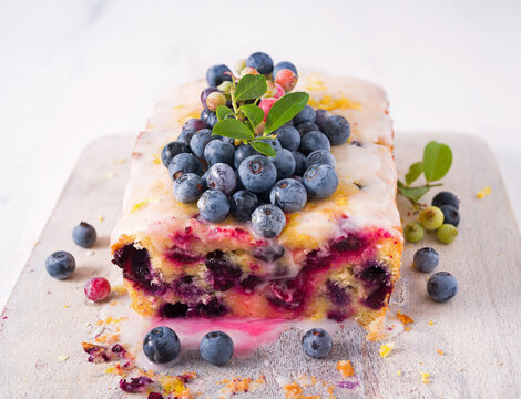 Homemade blueberry lemon loaf cake with fresh homegrown blueberries; copy space