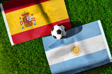 Obraz premium Spain vs Argentina, Final, national flags before international football match, football on green grass with stadium in the background, East Rutherford, July 19, 2026.