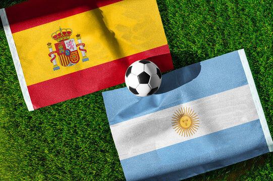 Spain vs Argentina, Final, national flags before international football match, football on green grass with stadium in the background, East Rutherford, July 19, 2026.