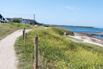 Fototapeta premium Quiberon peninsula in southern Brittany with wild west coast and sheltered east beaches; major holiday destination, surfing and water sports, thalassotherapy spas, coastal hiking, cycling, boat trips