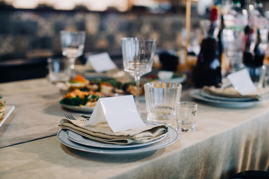 Elegant table setting with blank place card ready for guests