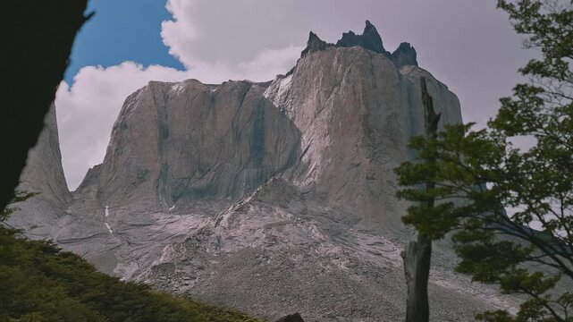 Rugged granite mountain peak being revealed at Britanico, Torres Del Paine, Patagonia, Chile