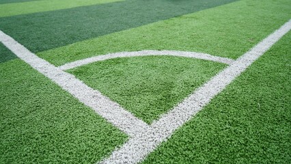 Fototapeta premium Close Up of a White Corner Line on a Green Soccer Turf Field