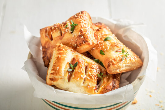 Delicious sausage in puff pastry as a snack for breakfast.