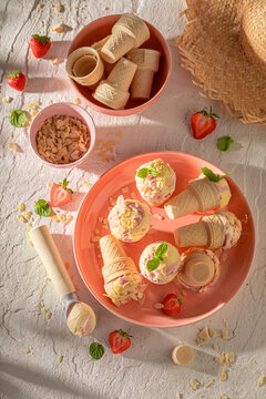 Homemade and juicy strawberry ice cream as a summer dessert.