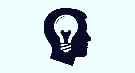 Profile of head with glowing light bulb icon. © Tane