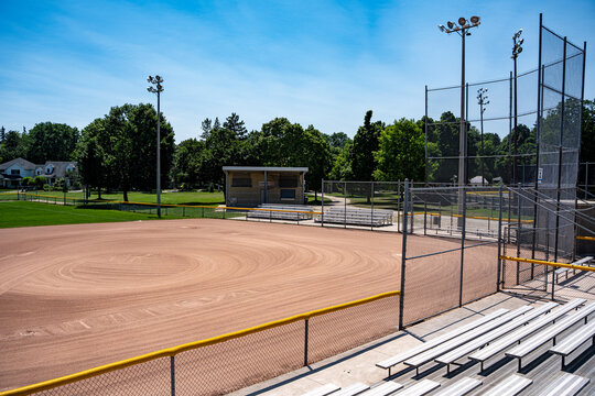 Empty baseball diamond viewed from stadium bleachers.