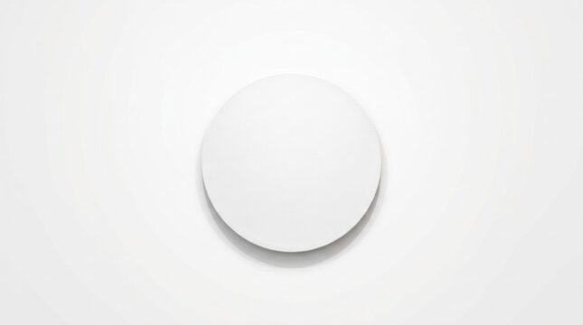 A white circle with a shadow on a white background, featuring a white circle with a shadow on a white background.