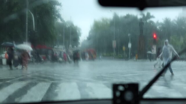 Sitting in a car during rain in Mumbai city India