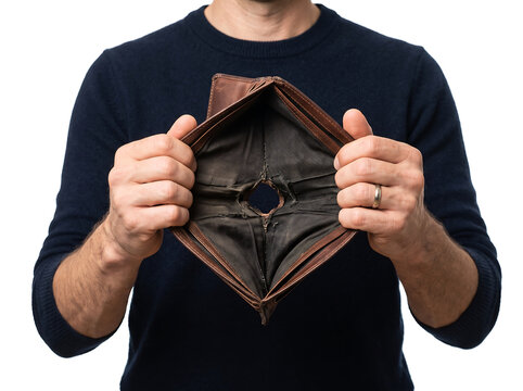 A man holds a wide-open, empty brown leather wallet, symbolizing financial hardship and lack of money.