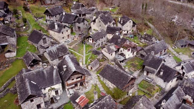 Historic stone village of Foroglio in Bavona Valley of Ticino. Aerial tilt-down