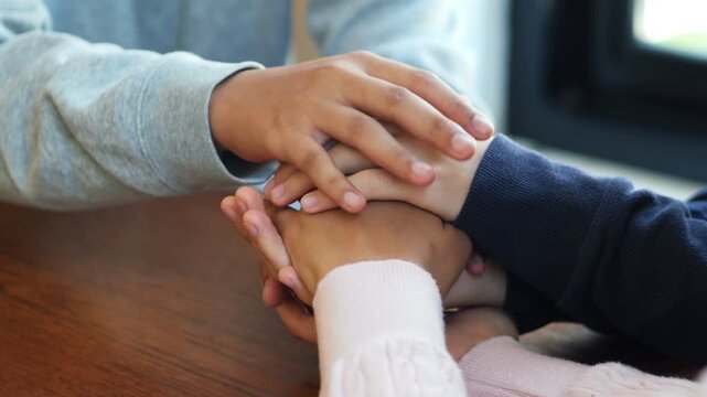 Group of people praying. Christian worship and pray. Christian group of people holding hands praying worships together to believe