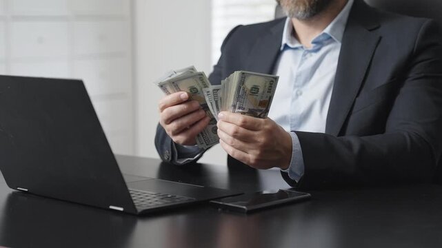 Finance concept with hand and money counter. Financial operations. Counting dollars. Accounting process. Investment concept. Finance managers hands with counting machine. Finance success.