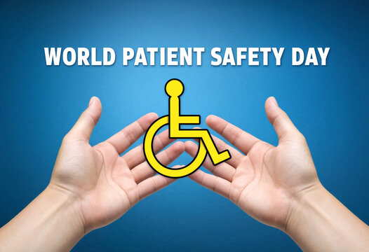 Caring hands holding a yellow disability symbol for world patient safety day awareness campaign