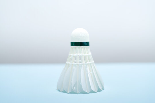 Close-up of Badminton Shuttlecocks on Light Blue Background