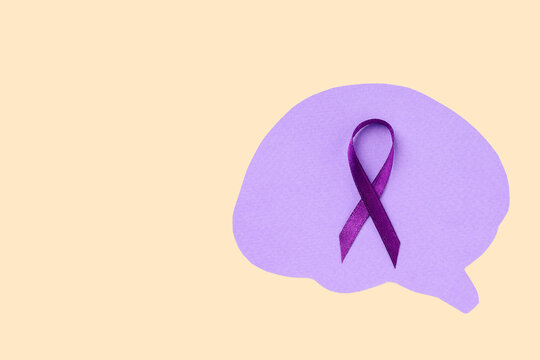 Purple ribbon symbol for mental health awareness