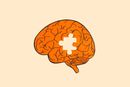 Colorful brain art with a missing puzzle piece symbolizing wholeness
