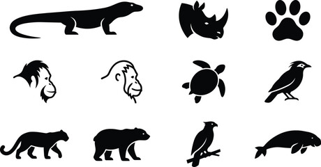 National animals wildlife symbols sheet featuring komodo dragon lizard profiles javan rhinoceros horn heads sumatran tiger paw prints orangutan contours © ArtFlex