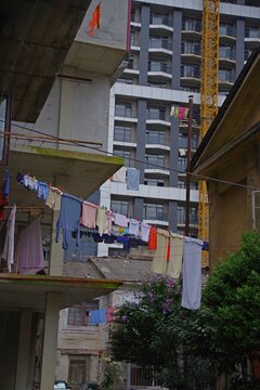 Urban contrast in Batumi with laundry drying against high rise building
