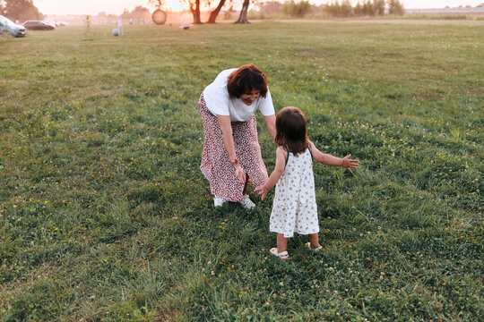 Mother and daughter walking together