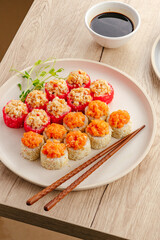 Assortment of fresh maki sushi rolls on a plate © Cavan