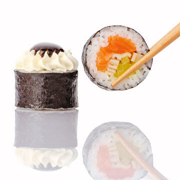 Assorted Japanese maki sushi rolls with chopsticks