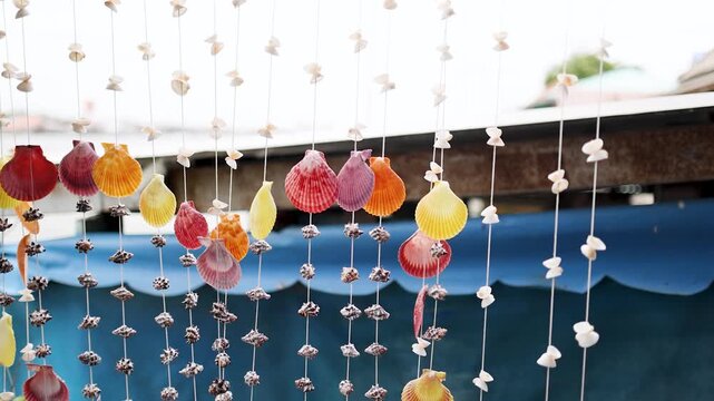 Colorful Seashell Curtain Hanging at a Tropical Souvenir Market