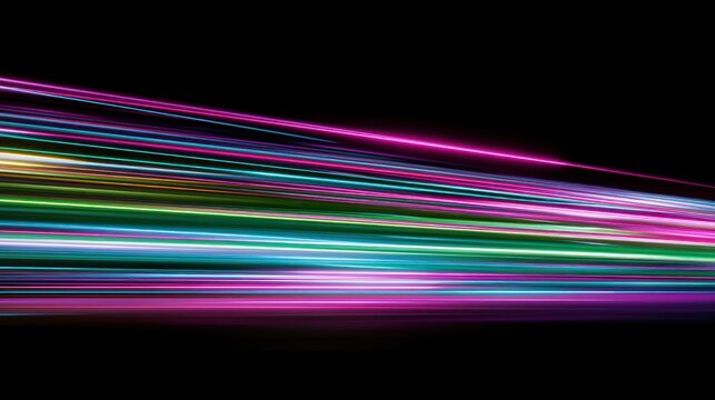 Abstract colorful light trails on black background