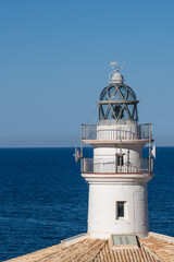 Mediterranean. White lighthouse on the coast of Cullera with the blue sky and the sea in the background © Inspiraciones