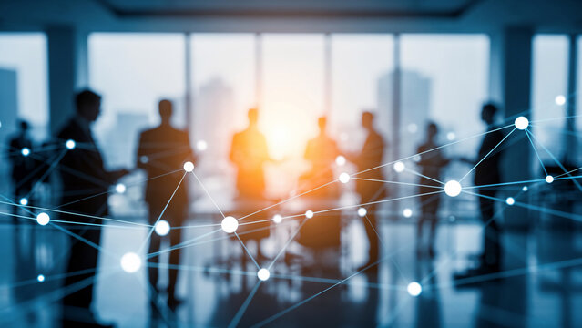 Blurred silhouettes of business people in a modern office with a glowing network overlay, ideal for corporate presentations, technology solutions and team collaboration concepts