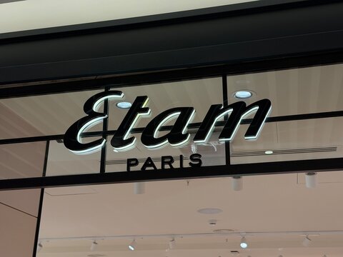 Mallorca, spain, july 09, 2026, etam paris retail store facade with illuminated brand logo signage at shopping mall entrance