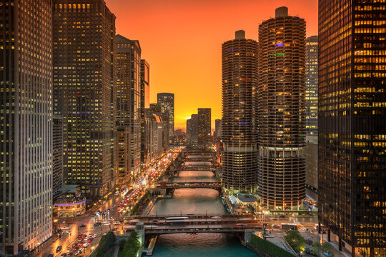Chicago cityscape and bridges over the river at night