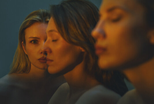 Surreal portrait of three women's faces