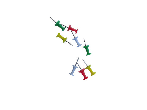 Colorful push pins arranged in a group