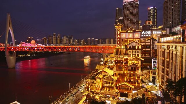 Chongqing cyberpunk city skyline with river and hongyadong night time