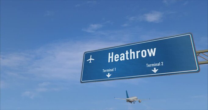 Airplane landing in Heathrow London. Plane travel to UK arrive with airport signboard.