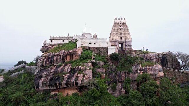 Drone view of Melkote temple nestled amidst scenic hills and countryside beauty