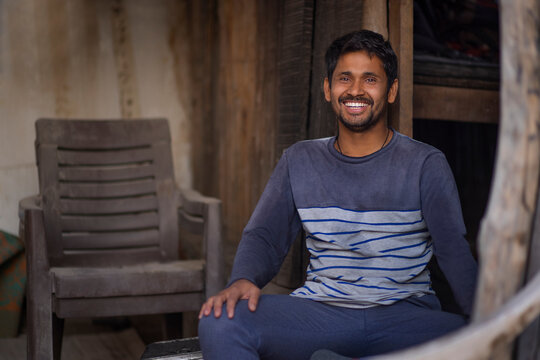 Rickshaw puller resting  in his hut