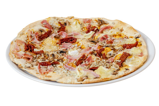 Gourmet pizza with prosciutto, sun dried tomatoes, mushroom, seeds