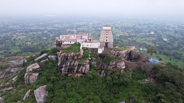Drone view of Melkote temple nestled amidst scenic hills and countryside beauty