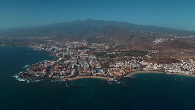 ocean shore with hotels and beach, Los Cristianos, Tenerife, Canary, aerial shot