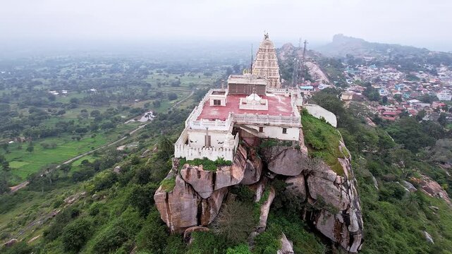 Drone view of Melkote temple nestled amidst scenic hills and countryside beauty