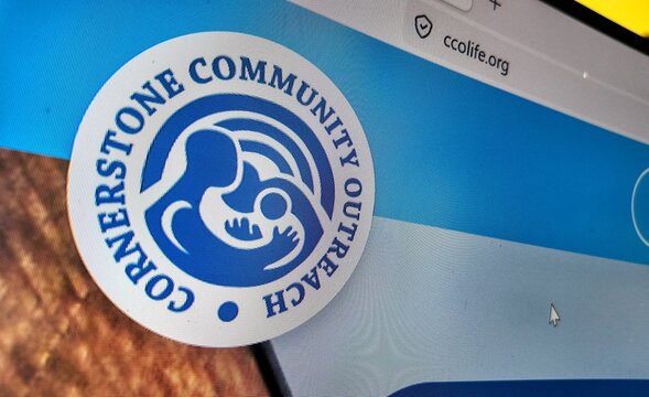 computer screen with cornerstone community outreach website displayed