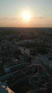 downtown plac litewski, city square and park at sunset, Lublin, Poland aerial drone view 4k, vertical video