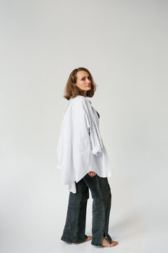 Woman Standing Sideways Oversize Shirt Studio