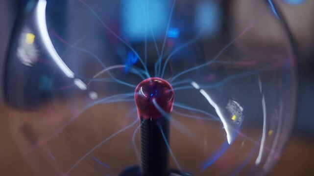 glass plasma tesla ball with electricity beams inside, science and experiments 4k