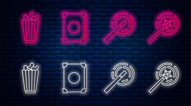 Set line Ancient magic book, Magic wand, Popcorn in box and Magic wand. Glowing neon icon on brick wall. Vector