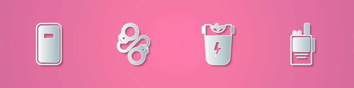 Set paper cut Police assault shield, Handcuffs, electric shocker and Walkie talkie icon. Paper art style. Vector