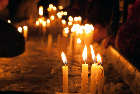Bolivia, Copacabana, illuminated candles inside the chapel of the Basilica, in a mix of Christian traditions and local Aymara beliefs and traditions